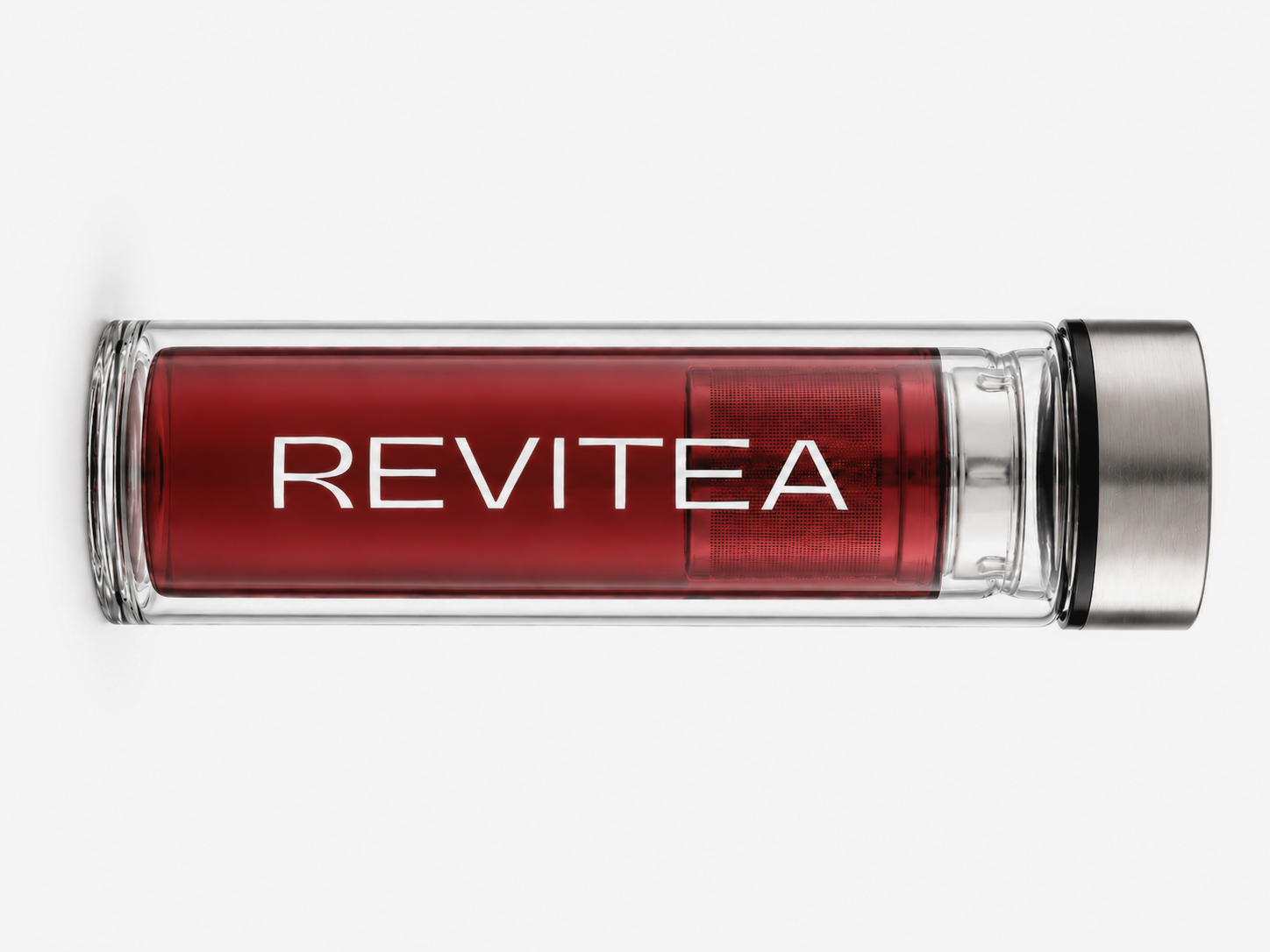 Revitea glass tea bottle with red liquid on a white background